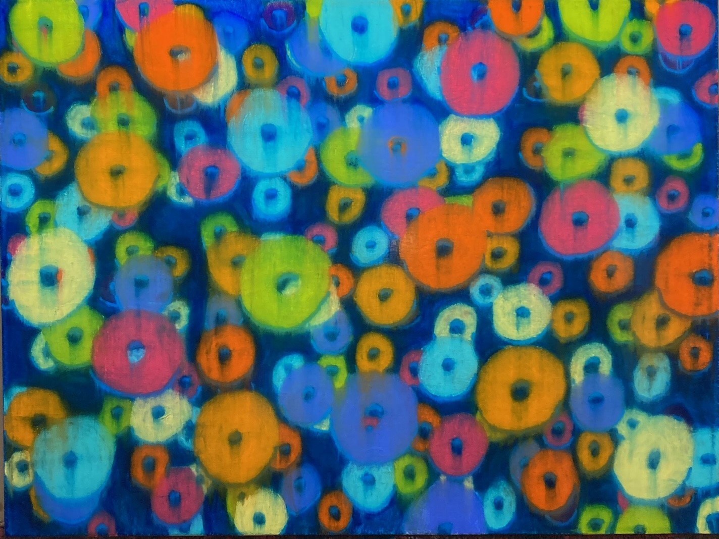 Froot Loop Planets II — glowing loops in orange, green, and pink over deep blue